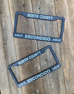2x USED North County Kia Escondido California License Plate Frame Black Plastic - Picture 1 of 8