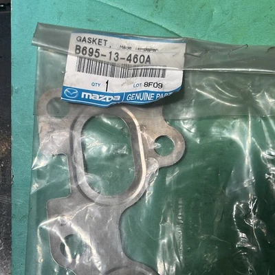 Junta de colector de escape interior Mazda 1988-1994 Miata 323 B695-13-460A OEM NUEVO Foto 1 de 4