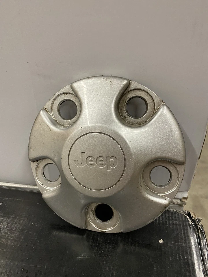 Tapa central llanta jeep wrangler liberty 5 tacos 2005-2007 OEM 52059583-AA Foto 1 de 1