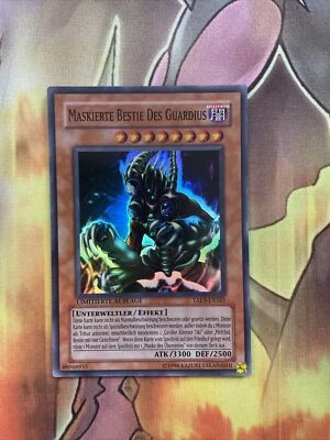 TAEV-ENSE1 Masked Beast Des Gardius, Limited Edition Yugioh Card, Super GERMAN - Image 1 of 4