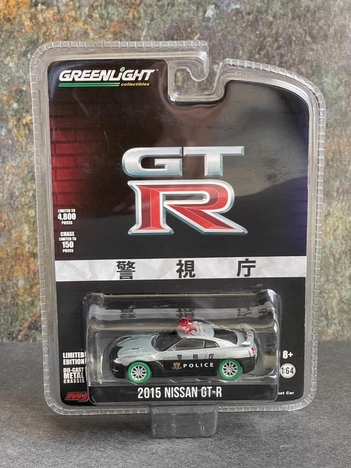 Nissan GT-R 2015 Greenlight Japón Police Chase Limited (1/150) máquina verde cruda Foto 1 de 4