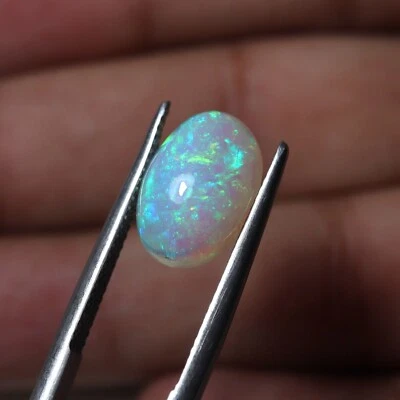 Cabujón ovalado ópalo etíope natural AAA verde azul fuego 3,7 quilates 13,4 x 9,3 x 5,7 mm Foto 1 de 4