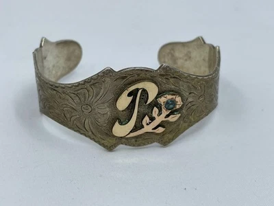 Brazalete vintage SILVERADO relleno de oro esterlina, piedra azul "T"  Foto 1 de 4