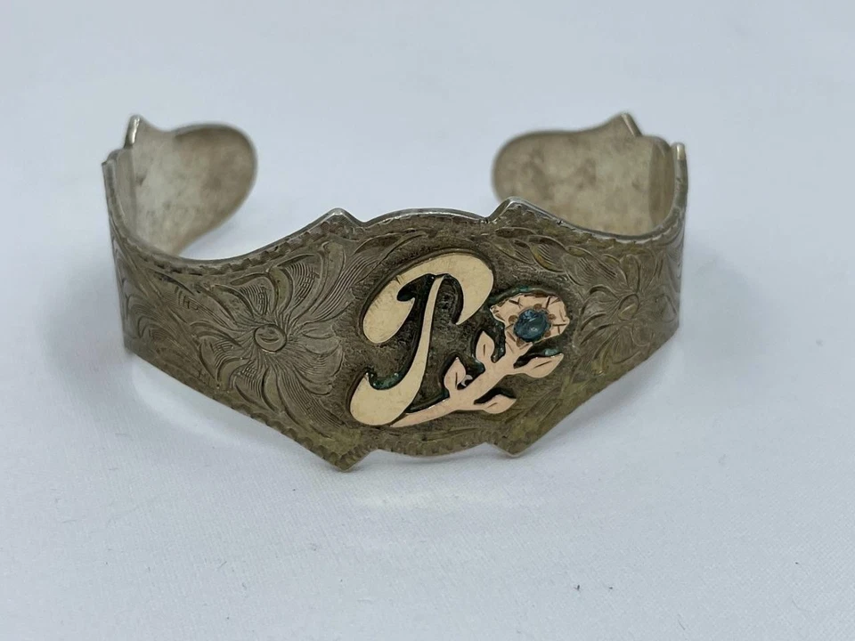 Brazalete vintage SILVERADO relleno de oro esterlina, piedra azul "T"  Foto 1 de 4