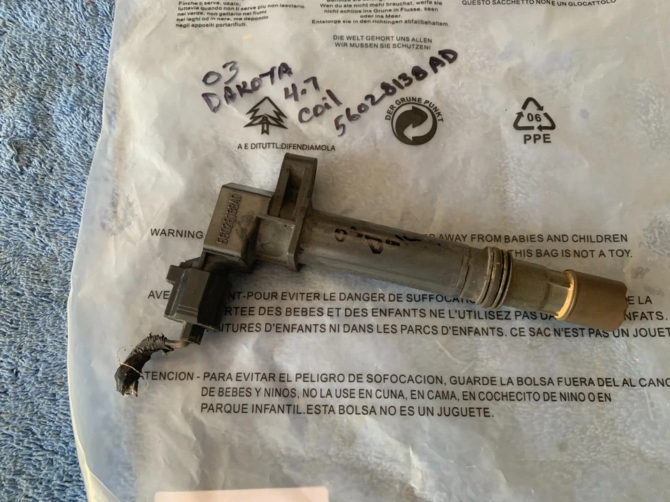 56028138AD 99 00 01 02 03 BOBINA DE ENCENDIDO DODGE DAKOTA DURANGO GRAND CHEROKEE Foto 1 de 4