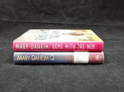 MARY DAHEIM The Alpine Traitor & Gone with the Win Murder Mystery Lot of 2 Book - Image 1 of 4