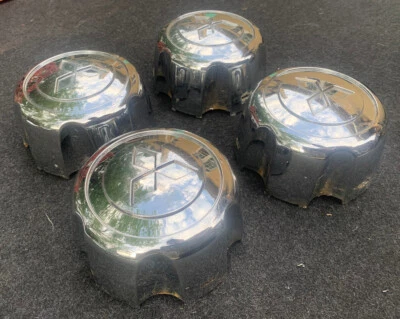 Tapacubos centrales cromados para rueda Mitsubishi Montero 2000-2004 OEM 5,25" 4 piezas MB816581 Foto 1 de 4