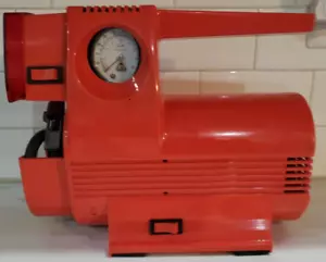 Compresor de aire eléctrico portátil vintage auténtico y luz probado por Interdynamics - Imagen 1 de 11