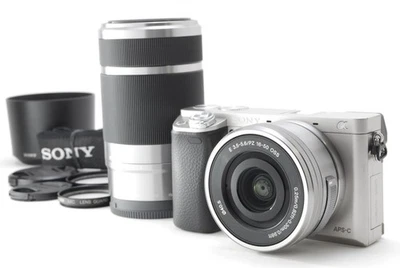 [SC: 8870] Sony Alpha A6000 (Kit with 16-50mm & 55-210mm Zoom) Silver Near Mint - Image 1 of 4