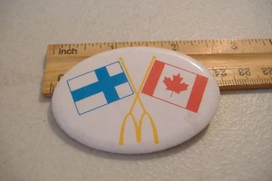 ~MCDONALDS~FINLAND & CANADA FLAGS~OVAL BUTTON PIN~ - Picture 1 of 2