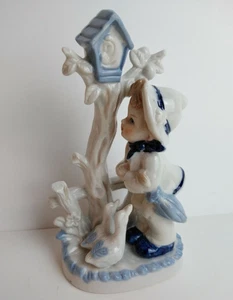 Blue and White porcelain figurine Boy w/umbrella looking up at Birdhouse in tree - Picture 1 of 8