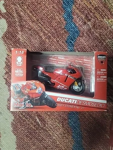 NIB Maisto Ducati Desmosedici Moto GP #27 Casey Stoner 1:18 Diecast Motorcycle - Picture 1 of 4