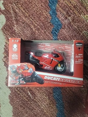 NIB Maisto Ducati Desmosedici Moto GP #27 Casey Stoner 1:18 Diecast Motorcycle - Image 1 of 4