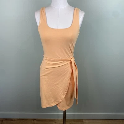 GB Melocotón Elástico Tejido Envolvente Falda Frontal Mini Vestido Talla Pequeña Se Ajusta Como XS/Sm Foto 1 de 4