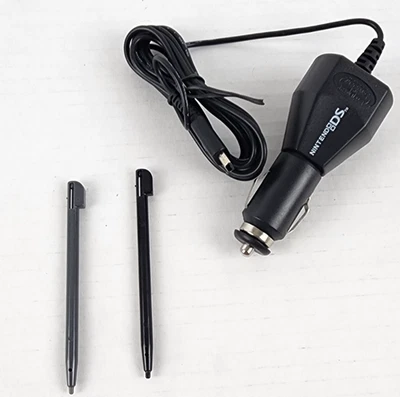 Nintendo DS OEM 12 Volt DC Car lighter Charger and 2 DS Pens Black and Grey - Image 1 of 4