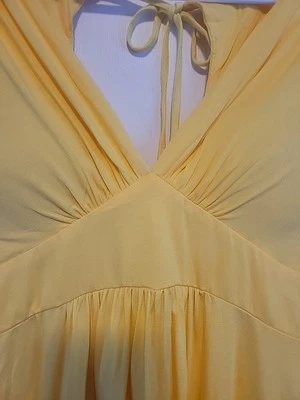 Camiseta sin mangas Papaya Y2K amarilla con lazo trasero para mujer - Elegante cómoda talla grande Foto 1 de 4