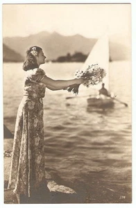 RPPC Brunette Woman FLOWERS Sailboat Shore TORINO ITALY 1941 Real Photo Postcard - Picture 1 of 2