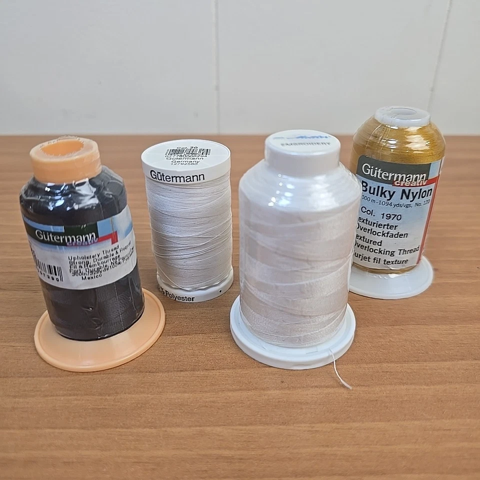 Gutermann & Mettler Sewing & Embroidery Thread Set of 4 Black White Gold - Image 1 of 4