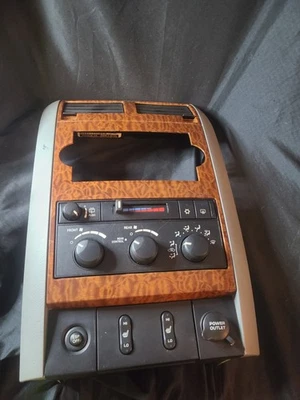 2007 Dodge Durango Radio Bezel With Climate Control Heated Seat Woodgrain - Image 1 of 4