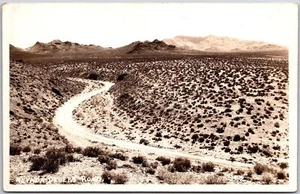 Nevada Desert Road Mountain Ranges Roadway Real Photo RPPC Postcard - Picture 1 of 2