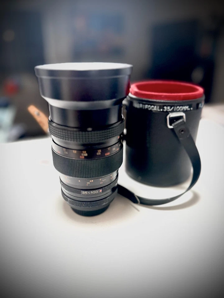 Lente zoom Konica Full Frame 35-100 mm f2,8 + Adaptador Canon EF | Cámara Zeiss Sigma Foto 1 de 3