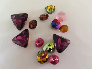 Konvolut 13 ausgefallene Swarovski Strasssteine. Größen, Formen, Farben - Bild 1 von 1