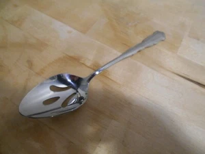 International Stainless COLONIAL MANOR Pattern Slotted Table Serving Spoon 6626 - Picture 1 of 3