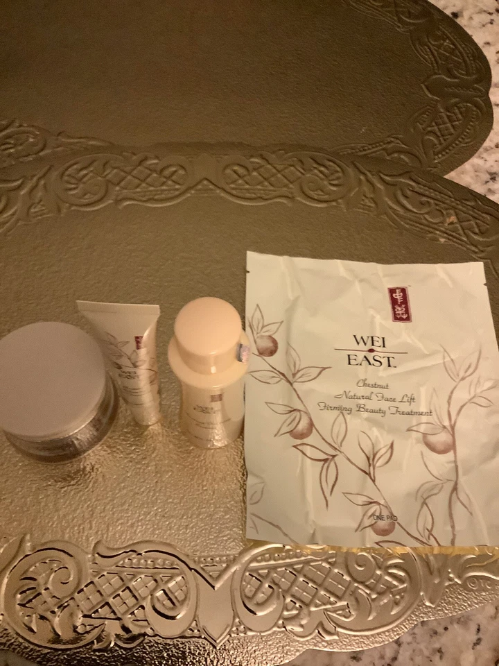 Wei East Chestnut Firming 4 Pc. Set NEW in a Beautiful Embossed Gift Bag - Image 1 of 4