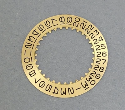 Genuine Rolex #7961 Gold tone Date disc / indicator for Calibers 1530 1570 1575 - Image 1 of 4
