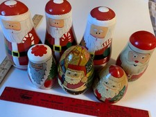 7 santa Christmas Theme Nesting Doll Sets vintage folk art
