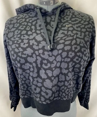 Sudadera de entrenamiento recortada con capucha para mujer Nike talla mediana estampado de guepardo negra Foto 1 de 4