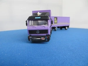herpa lkw 1:87 Herpa MB NG Koffer del mod Internationale mode Delmenhorst - Bild 1 von 6