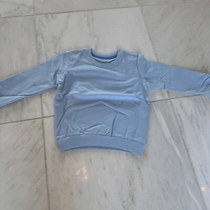 Kids Age 6 Light Blue Long Sleeve Never Worn - Picture 1 of 5