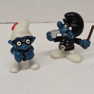 Vintage Peyo Schleich 1981 Hong Kong poliziotto e rapinatore - Foto 1 di 14