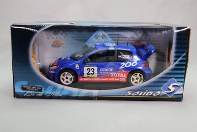 LJ638 SOLIDO RACING 202991-10 1/18 Voiture Peugeot 206 WRC Catalunya 2002 #23 - Photo 1/4
