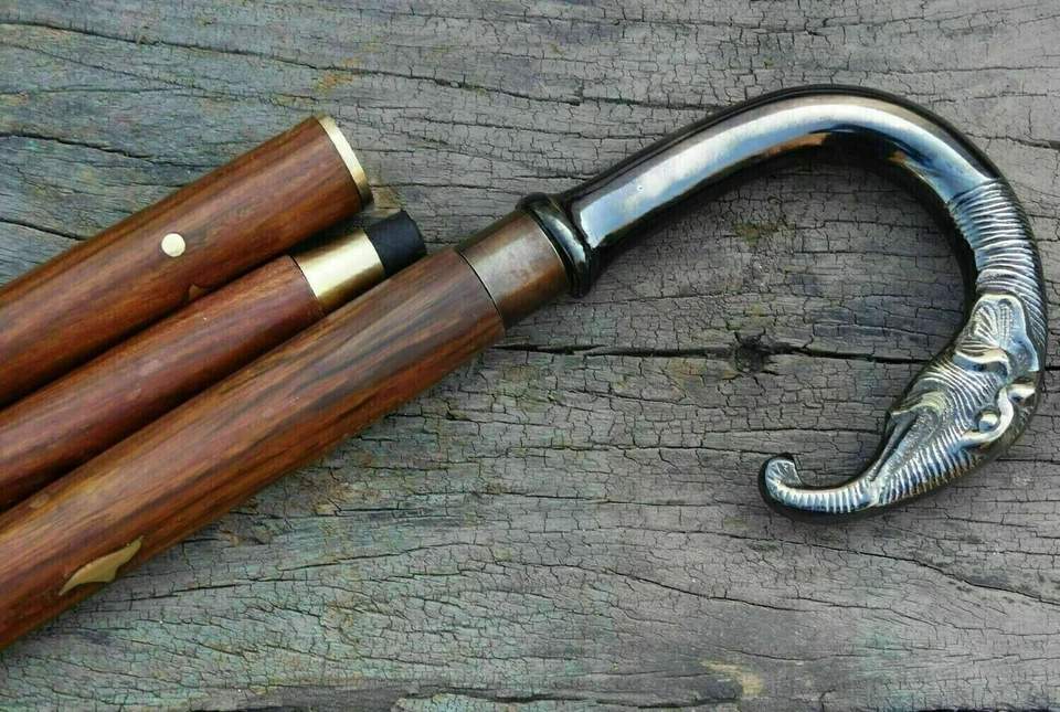 Bastón de madera con mango de elefante acabado antiguo negro de latón de diseño Foto 1 de 4