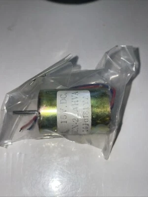 Nikon MD-4 (40FA97) Parte# FA1-50 Motor 15 Voltios DC NOS OEM Foto 1 de 2