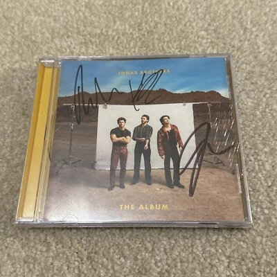 JONAS BROTHERS THE ALBUM NEW SIGNED CD FULL BAND Nick Joe & Kevin AUTOGRAPH Foto 1 de 4