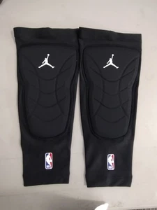 Juego de 2 espinilleras negras emitidas por la NBA Nike talla 2X/3X CU6688 - Imagen 1 de 13