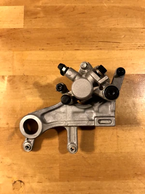 HONDA CRF450R CRF 450R CRF250R 250R REAR BRAKE CALIPER MOUNT 250RX 450RX - Image 1 of 4