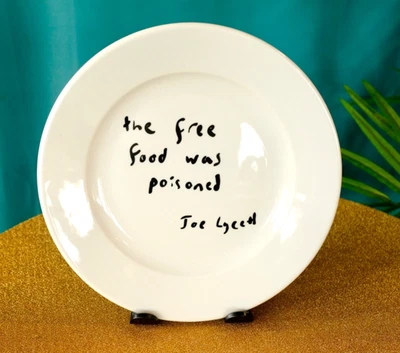 SKY ARTS: dinner plate designed by Joe Lycett: THE FREE FOOD WAS POISONED - Image 1 of 4