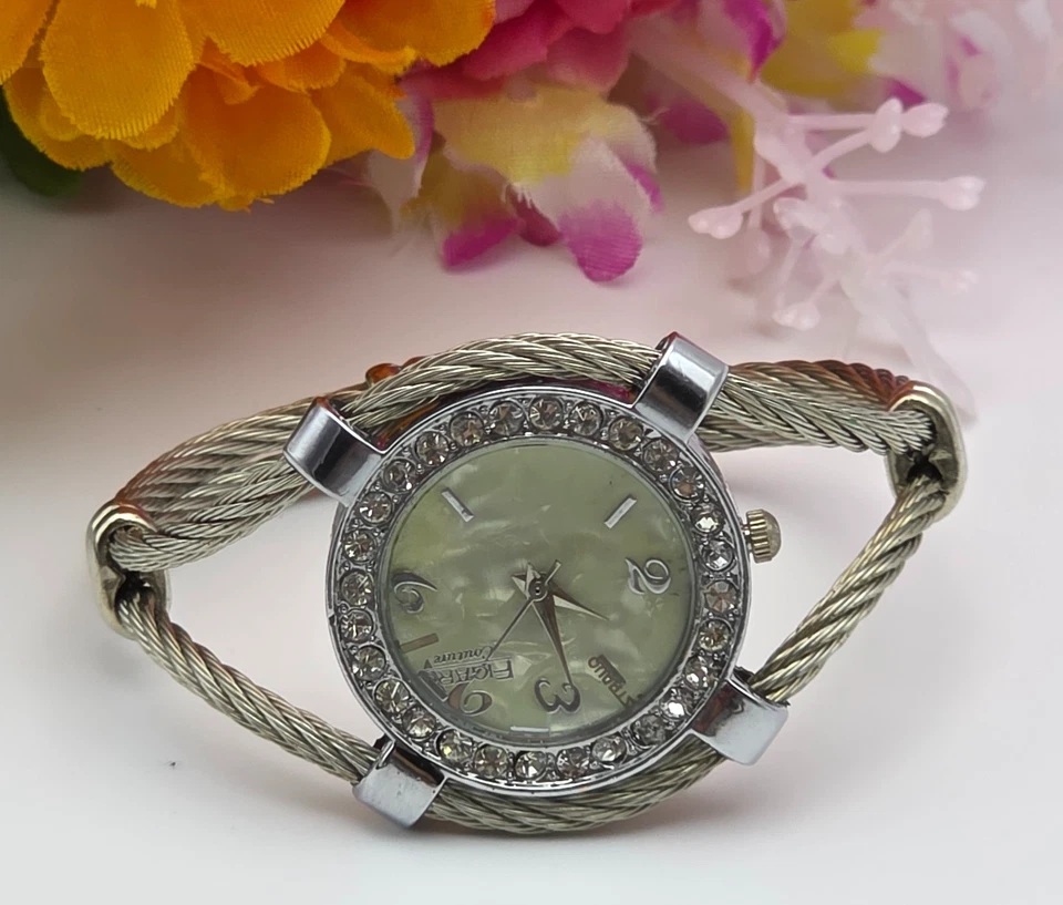 Reloj de puño Figaro Couture tono plata cuerda retorcida 32 mm madreperla vintage Foto 1 de 4