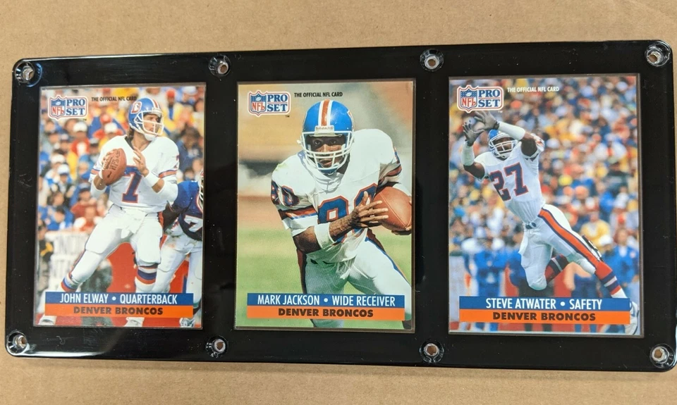 PLACA DE 3 TARJETAS DENVER BRONCOS JOHN ELWAY MARK JACKSON STEVE ATWATER Foto 1 de 1