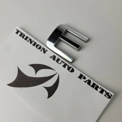 Chevrolet Aveo5 2004-2011 tapa trasera emblema maletero logotipo letra E solo cromo OEM Foto 1 de 3