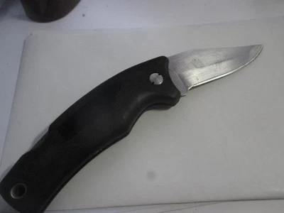 Cuchillo Schrade SG7 Lockback. Asas antideslizantes sintéticas negras Foto 1 de 4
