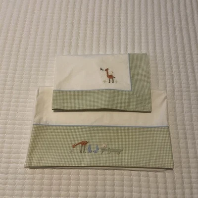 Funda plana/almohada para cuna de bebé Jacadi bordada a cuadros zoológico verde azul borde Foto 1 de 4