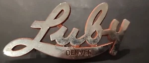 Luby--Denver- -Metal Dealer Emblem Car vintage SM6488 - Picture 1 of 3