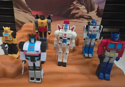 6 Super 7 Reaction Transformers Autobots Action Figure Lot - Image 1 of 4