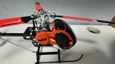 OMP HOBBY M2 R/C Heli con fuselaje Hughes 300 y microheli ¡3 cuchillas de cabeza!! Foto 1 de 4