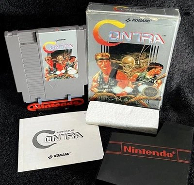 1987 年 CONTRA • 工作带复古盒子和插件 • 复古 NES NINTENDO 视频游戏 — 第 1/4 张图片